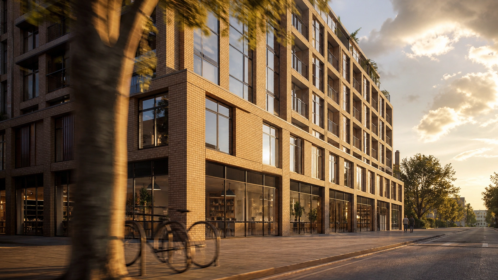 Photorealistic cinematic architectural animation still from a 25fps V-Ray 7 film showing a contemporary 8-storey mixed-use development in warm buff brick and dark metal-framed glazing at street level with golden hour afternoon sun long shadows subtle foreground motion blur from a slow camera dolly move and two distant human silhouettes