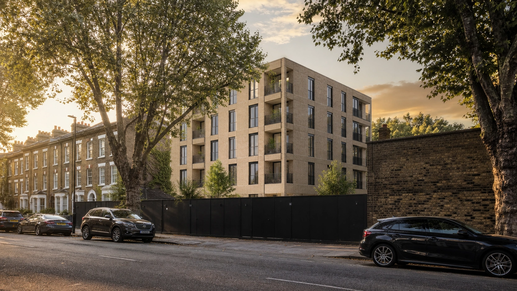 Photorealistic exterior rendering photomontage final composite at street level 50mm focal length showing a CGI contemporary 6-storey residential development in warm buff brick integrated into a real site photograph with Victorian terraces clearing plot hoardings mature street trees matching grain profile atmospheric perspective and late afternoon golden light